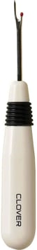 a white bellow with a black handle and a black handle
