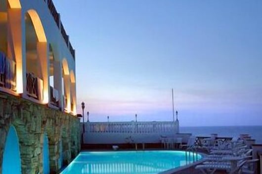 a pool with a view of the ocean