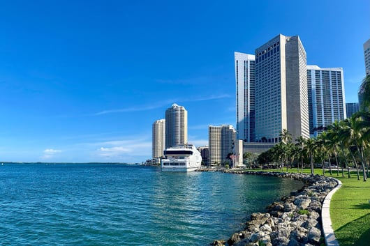 a boat in the water near a hotel, InterContinental Miami