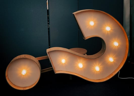 a lighted letter g with a large light up