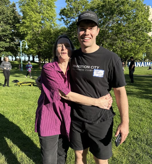 dustin king and his mom hugging in the wellness park
