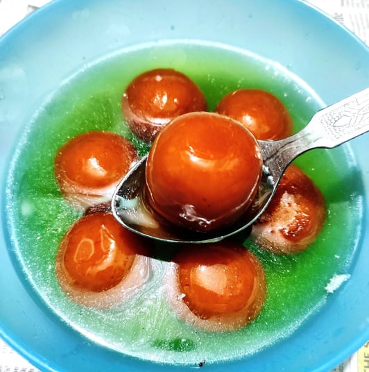 gulab jamun a sweet made with milk product and sugar syrup