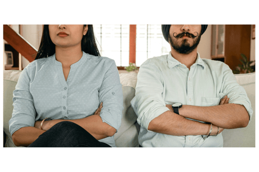 couple arguing, locked in a power struggle