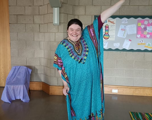 Young lady dancing with a big smile