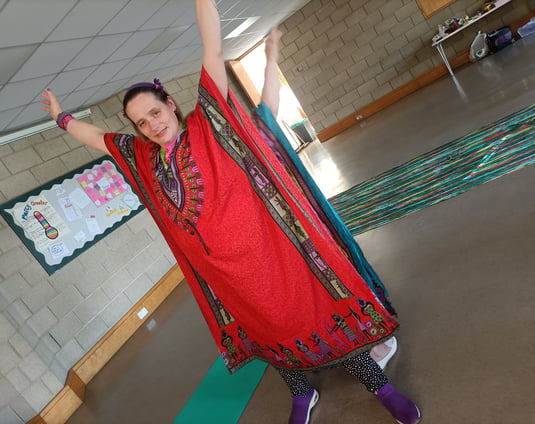 A woman performing creative movements