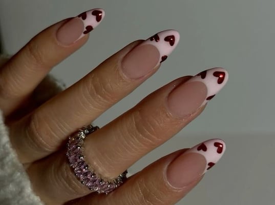 Valentine's nail inspo pink french with red chrome hearts