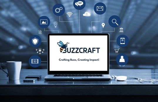 a laptop computer on a desk with buzzz craft