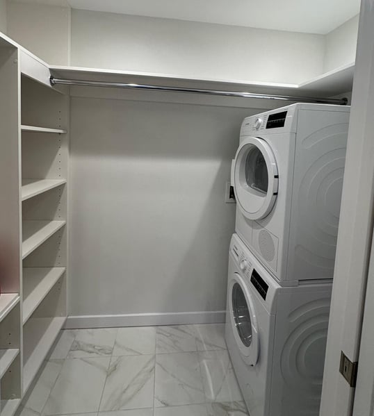 a laundry room with a washer and dryer