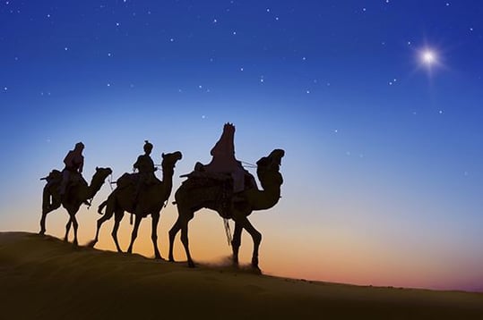 wise men following Christmas star to Bethlehem