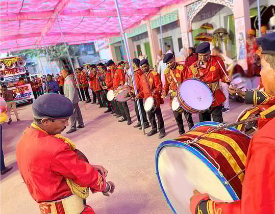 The crew of Manohar Brass Band playing music at a Gangaur show in Bijainagar, Ajmer.