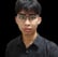 a man with glasses and a black shirt