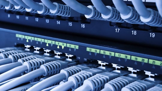 a bunch of cables connected to a computer and a bunch of wires