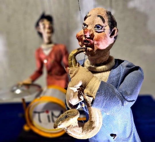 a couple of puppets of a man and a woman