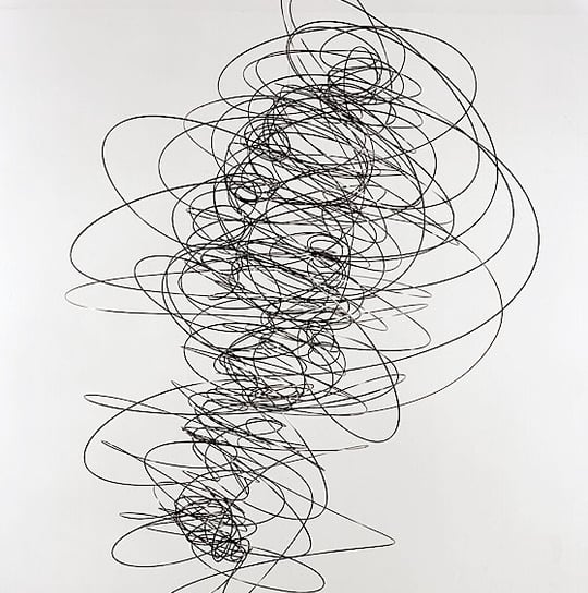 a large black and white sculpture os oscilation