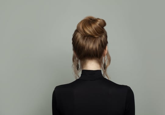 Hair model with elegant updo hairstyle