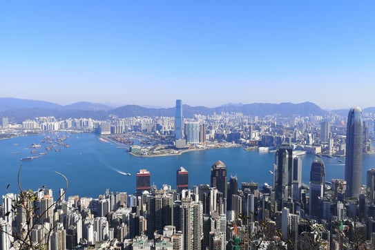 View of Victoria Harbour in Hong Kong with skyscrapers