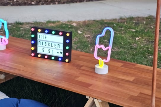 teepee picnic table rissler theme with balloon garland