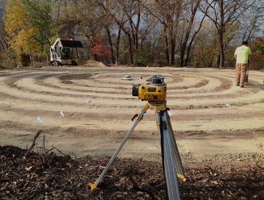 a man standing in a circular maze maze maze