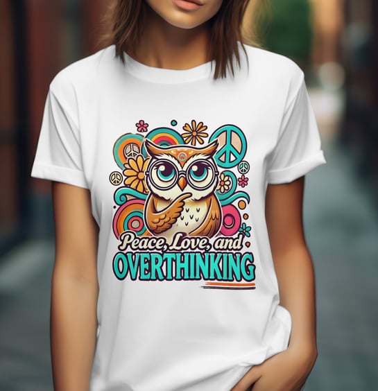 Female wearing a shirt that says peace, love and overthinking with an owl amongst peace signs in a v