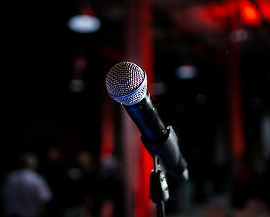 Karaoke: a microphone and a microphone in front of a microphone