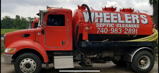 Carl Wheeler Septic Inc. logo