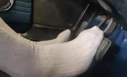 Manlyfoot using his white socked feet to pump a classic cars pedals typical of pedal pumping