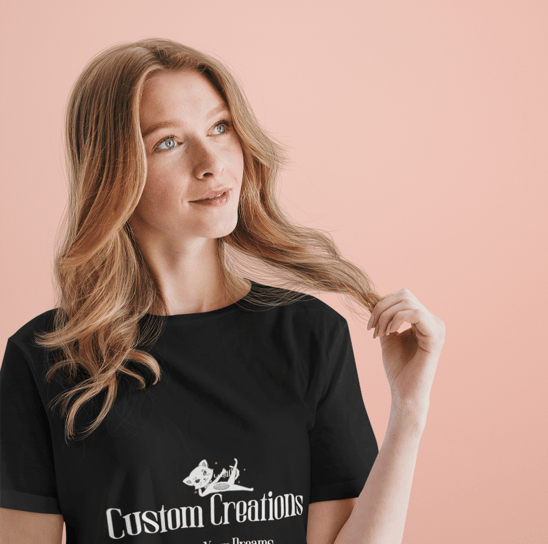 a woman wearing a black t - shirt with a custom logo on it
