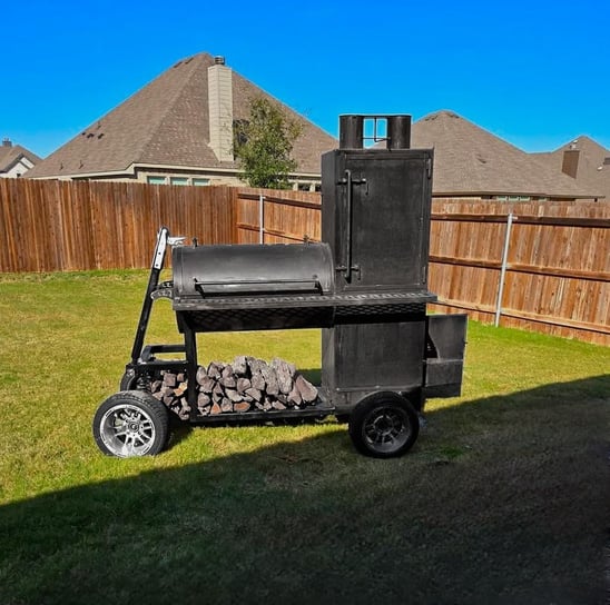 BBQ smoker with large smokestack for large events