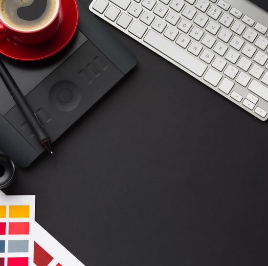 Image of keyboard and pad on a desktop