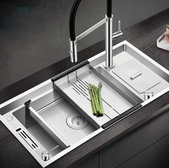 a handmade kitchen sink with strainer and interior sink