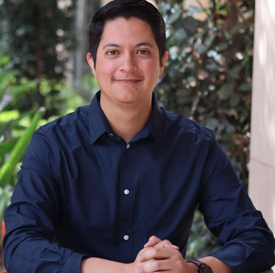 Jorge Duarte - a man in a blue shirt and a watch on his wrist