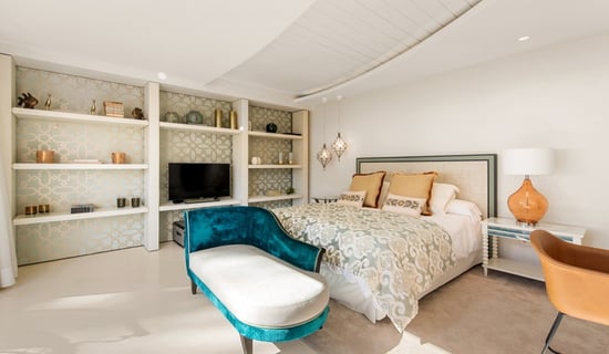 Guest room in the guest house of Villa El Rincon, Marbella, featuring stunning garden and sea views.