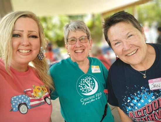 Smiling neighbors at the Memorial Day Picnic in Crescent Hills Park