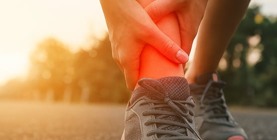 Common sports injury symptoms: swelling, pain, bruising, limited movement.