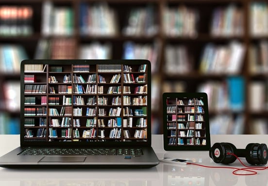 Laptop and smartphone set against a bookshelf backdrop, highlighting an online bookshop for specialized documentary resources