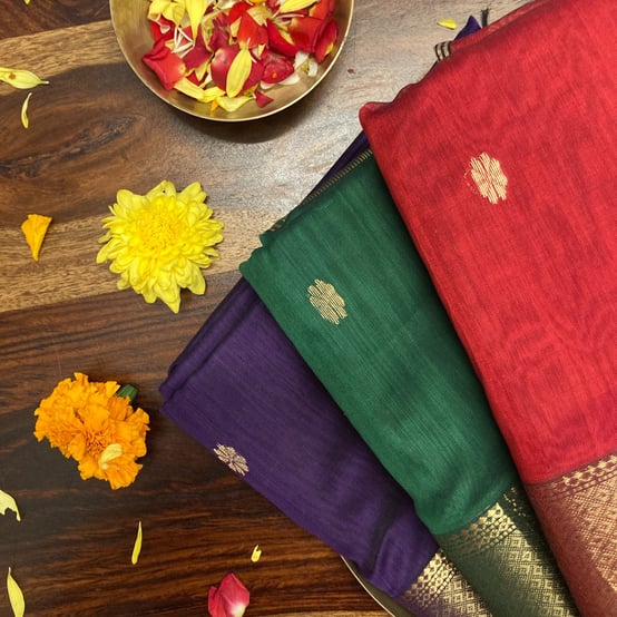 handwoven Maheshwari saree in silk-cotton blend, with zari borders and traditional motifs