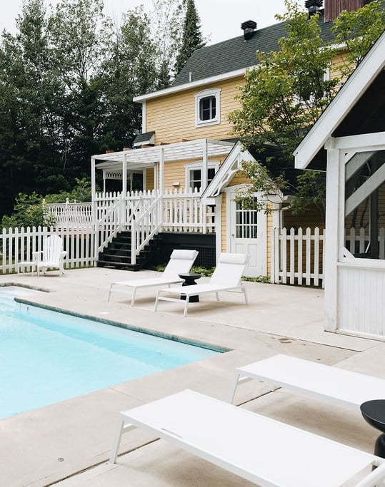 a pool with a beach ball in the middle of the pool