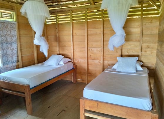 Simple and clean double occupancy bungalows at Afulu Surf Resort