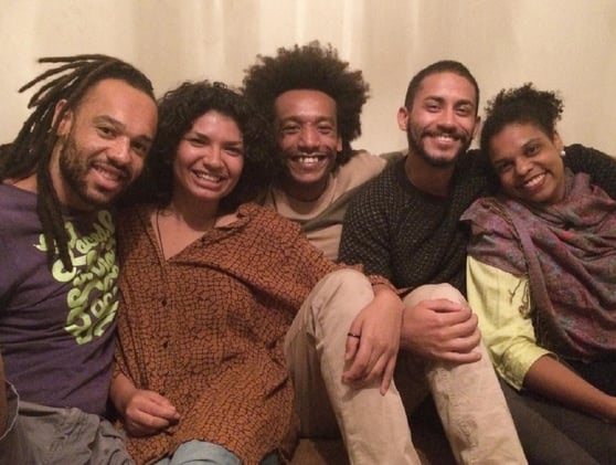 a group of people sitting on a couch