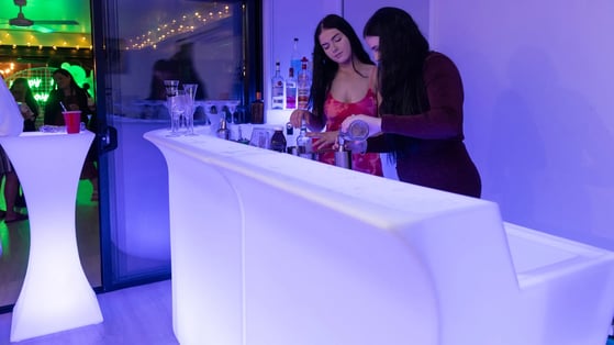 Vow renewal event in Redland Bay hired glow bar, cocktail tables and neon.