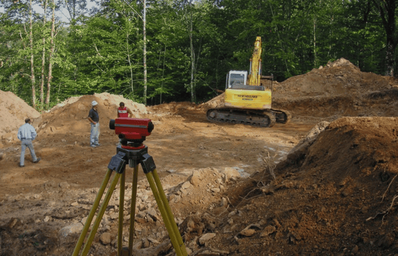 a man standing in front of a construction site