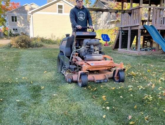 oja-lawn-and-landscape-employee-on-a-mower.jpg