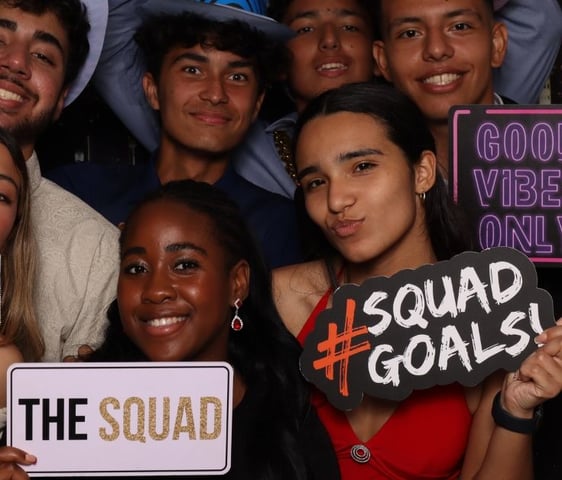 Group of teenagers posing for a photo booth photograph
