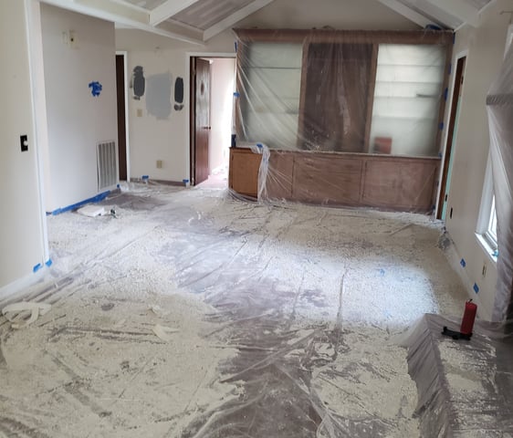 Removing popcorn ceilings. It's a messy business.