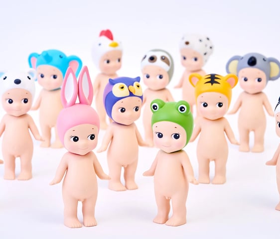 Sonny angels with animal headwear stood up on a white background.