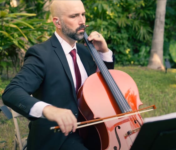 Treavor Eaton Music playing his cello at a wedding