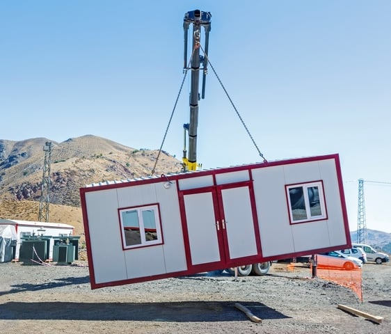 This image shows a high-quality prefabricated porta cabin designed for use as temporary site office.