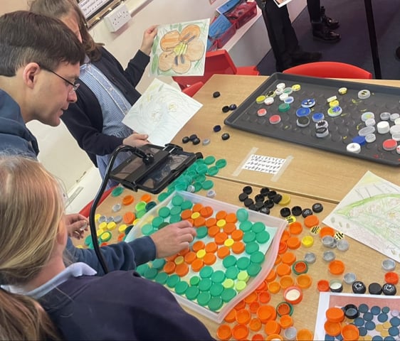 Teacher in a primary school with children