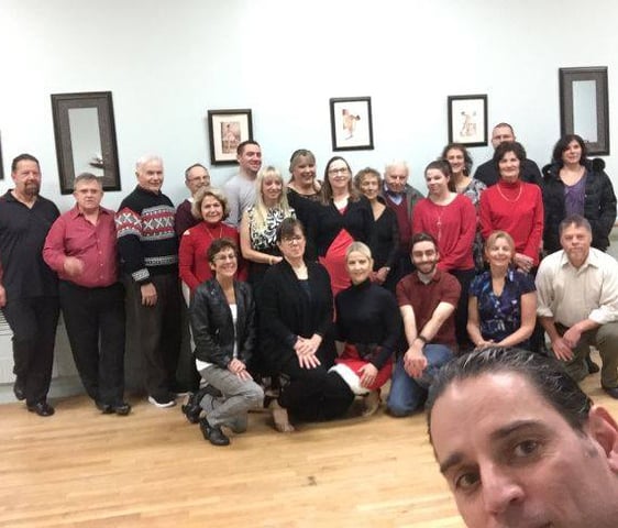 Mekhael Srour and Martha Slater with some of their students