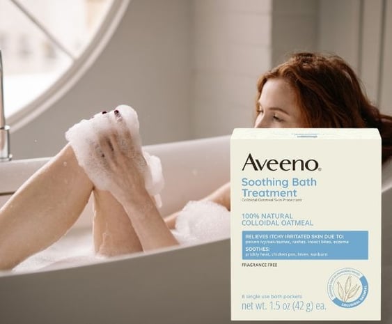 woman taking a bath using Colloidal Oatmeal